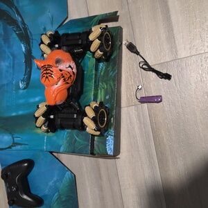 New In Box Beast Stunt Car - Black and Orange